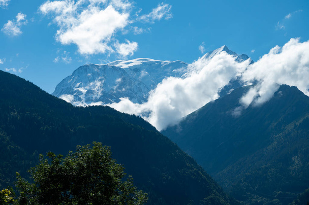 View from Saint-Gervais-les-Bains to white top of Mont Blanc mountaine range in summer, French Alps - Photo, Image