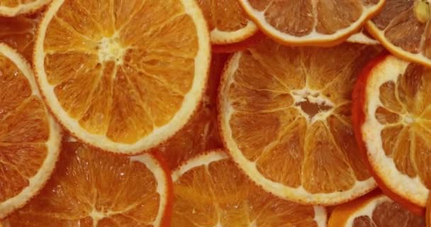Dried orange slice. Slice oranges rotate.Background Food. Super slow motion - Filmagem, Vídeo