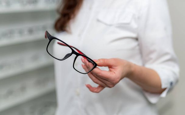 Eyewear correction stylish frame with glasses. Eyeglass lenses close up view. Stock photo - Фото, изображение