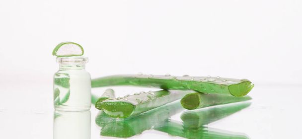 Fresh aloe vera leaf extract, natural cosmetic. - Фото, изображение