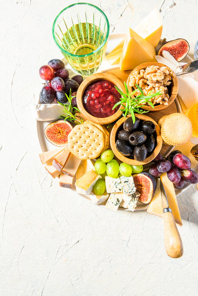 Cheese Platter or Cheese Board with Fruits, HErbs, Honey and Crackers. - Fotografie, Obrázek