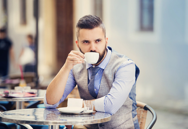 Businessman drinking espresso coffee - Photo, image