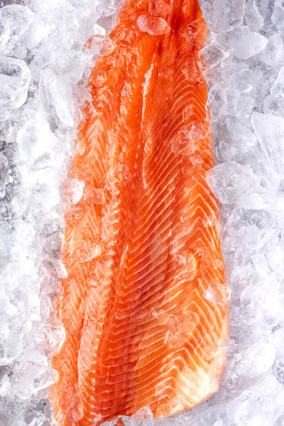 Fresh Raw Salmon Fish Piece on Ice. - Фото, изображение