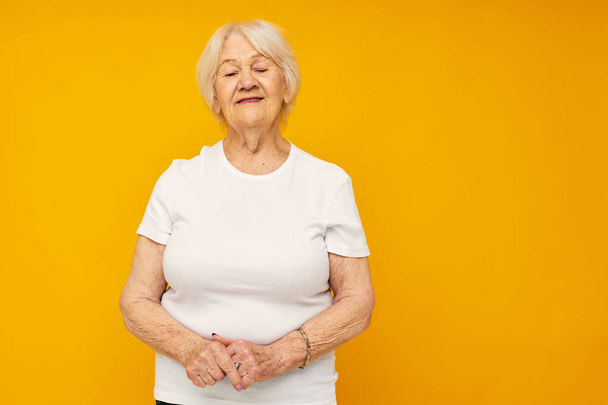 Photo of retired old lady posing face grimace joy isolated background - Photo, Image