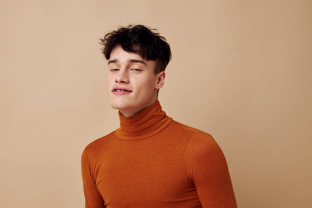 portrait of a young man brown turtleneck posing fashion Lifestyle unaltered - Foto, Imagem