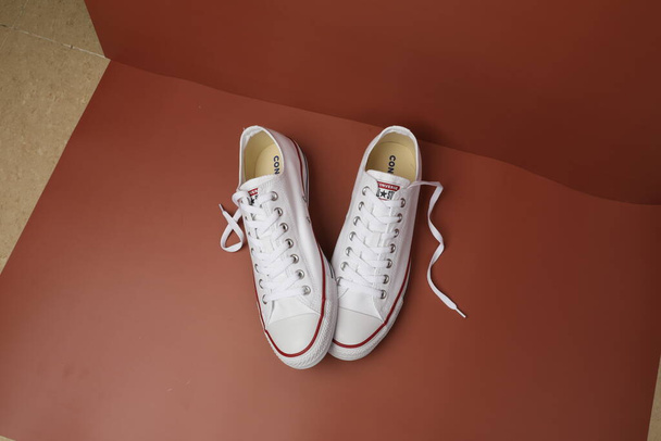 pair of beautiful sneakers on a pink background - Foto, immagini