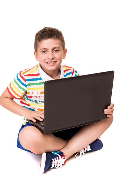Kid using a computer - Foto, Imagen