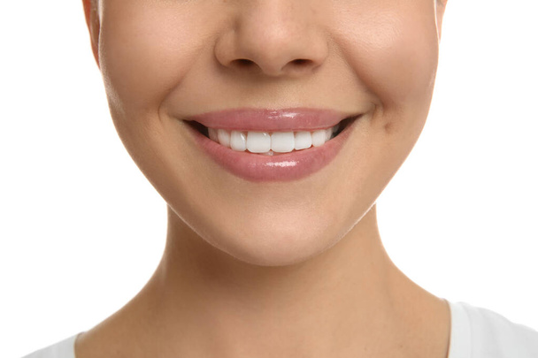 Young woman with healthy teeth on white background, closeup - Φωτογραφία, εικόνα