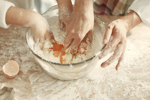 Family cook the dough for cookies - Fotó, kép
