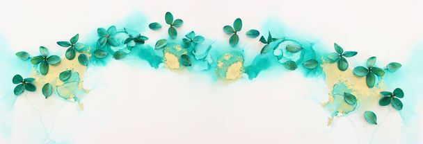 Creative image of emerald and green Hydrangea flowers on artistic ink background. Top view with copy space - Zdjęcie, obraz