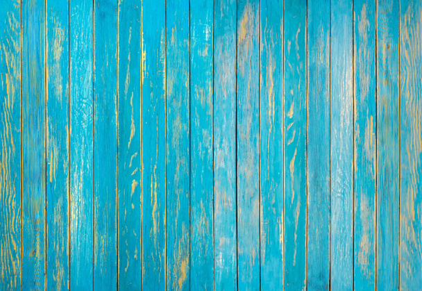 Textura de las viejas tablas de madera azul cielo de mala calidad. El patrón de revestimiento de madera superficial. Valla de madera. - Foto, imagen