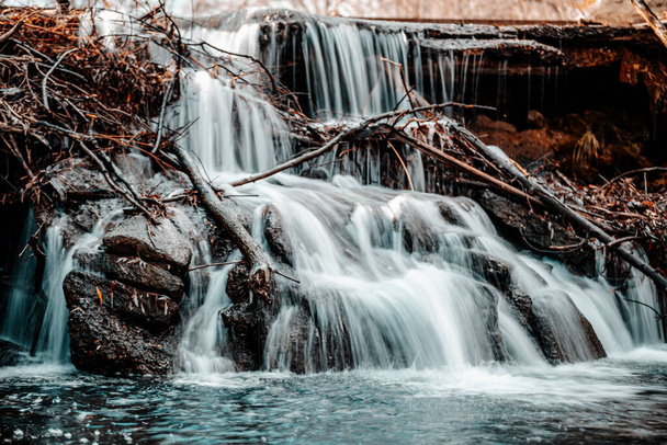 beautiful waterfall in the forest - Valokuva, kuva