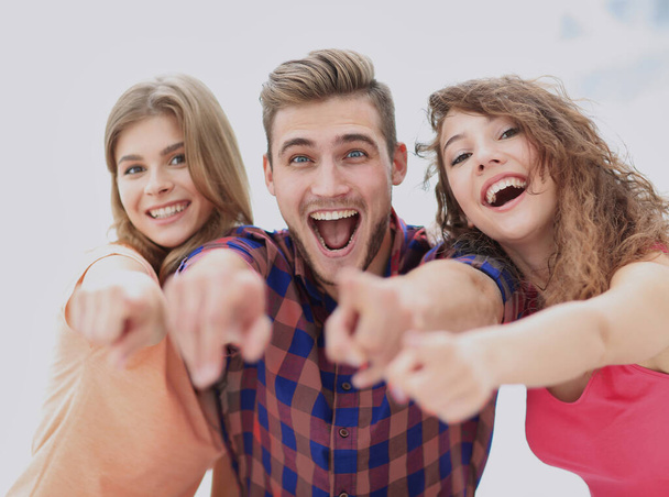 closeup of three happy young people showing hands forward - Фото, зображення