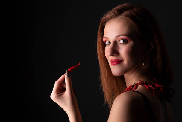 Young Woman With Chili Pepper - Photo, Image