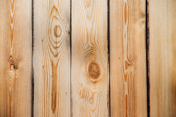 Brown wood texture. Abstract background. rustic background made of old wooden boards with holes and nails. - Photo, image