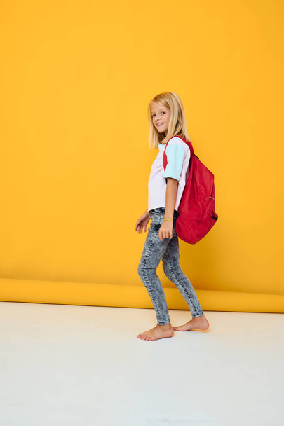 portrait of cute girls stylish clothes red backpack education concept - Фото, изображение