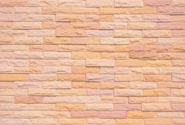 Orange and white brick wall texture background. Brickwork and stonework flooring interior rock old pattern clean concrete grid uneven bricks office design. Background old vintage brick wall backdrop - 写真・画像