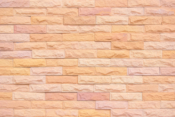 Orange and white brick wall texture background. Brickwork and stonework flooring interior rock old pattern clean concrete grid uneven bricks office design. Background old vintage brick wall backdrop - Foto, Imagem