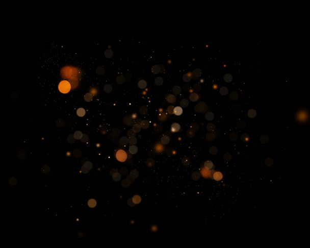 Defocused soft light and bokeh glitter lights background. Golden shimmering particles abstract bokeh glitter background. Abstract dust bokeh background. - Foto, afbeelding