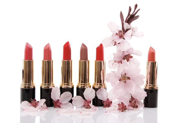 Different red lipstick and cherry flower, beauty concept - Foto, Bild