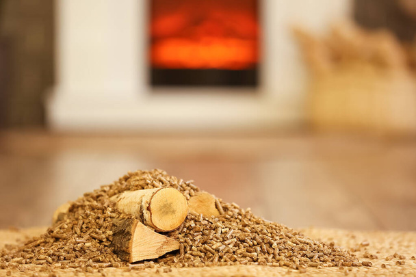 Pellets with woods in living room, closeup - Photo, Image