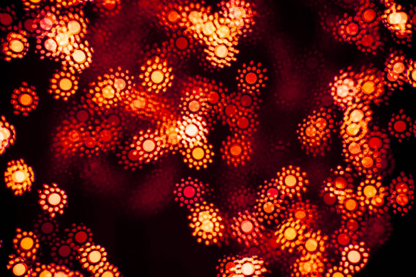 Abstract blurry, low depth of field bokeh light shapes. Vivid, colourful light effects background picture with different shapes and dots in various colours. Perfect for Christmas backgrounds - Фото, зображення