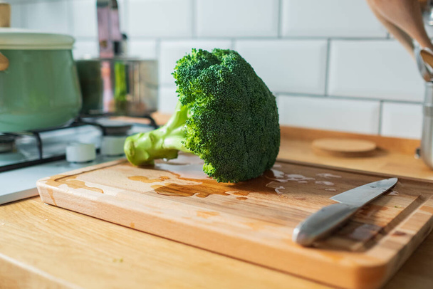 Fresh broccoli isolated on a kitchen table - Photo, Image