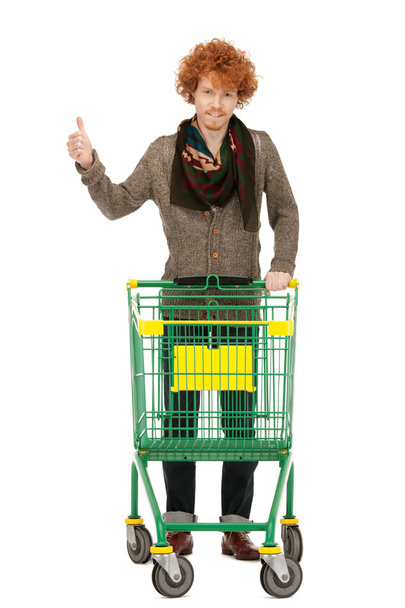 Man with shopping cart - Foto, afbeelding