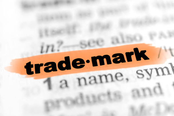 Trademark - text with orange marker  - Photo, Image