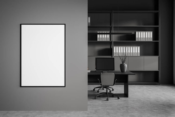Dark office room interior with empty white poster, shelves with folders, armchair, desktops and concrete floor. Perfect place for working process. Mock up. 3d rendering - Foto, afbeelding