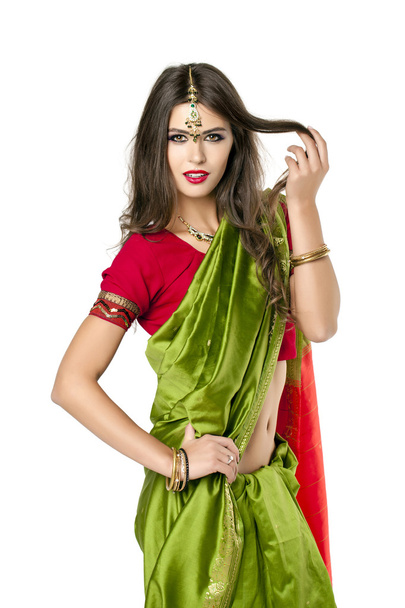 Young pretty woman in indian red dress - Фото, зображення