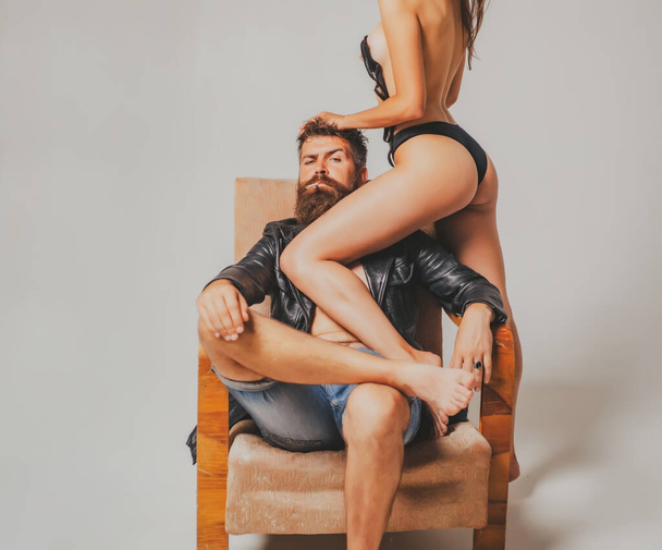 Sexy couple in love. Sensual boyfriend embraces lovers. The concept of tenderness and affection. - Foto, Bild