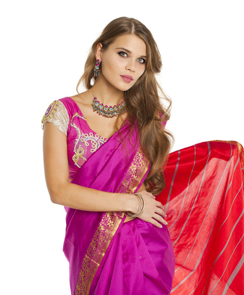 Young pretty woman in indian red dress - Fotó, kép