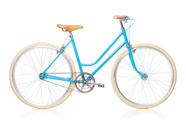 白で隔離されるスタイリッシュなレディース ブルー自転車 - 写真・画像