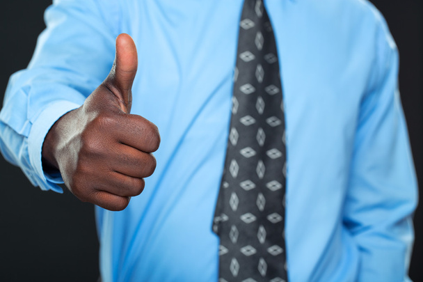 Young successful Businessman Showing Thumb Up - 写真・画像