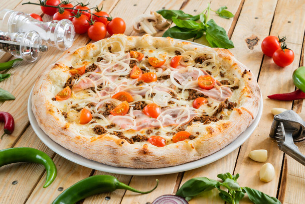 italian pizza on the wooden background - Photo, Image