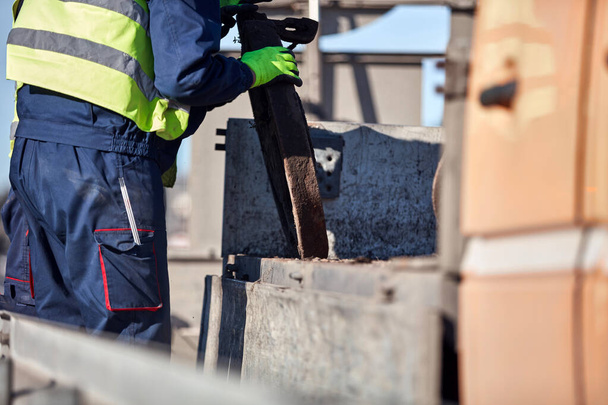 Construction maintenance workers working at public site street road. - Fotó, kép