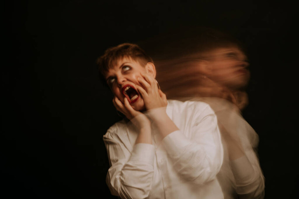 portrait of psychopathic woman with mental disorders - 写真・画像