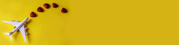 Airplane model. airplane on yellow background. selective focus.holiday - Valokuva, kuva