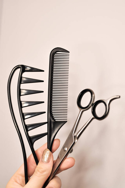 Equipment for hair stylist on black background . High quality photo - Foto, afbeelding