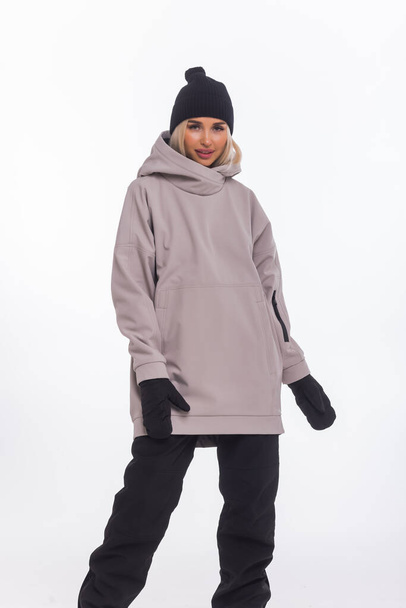 Skier happy caucasian satisfied smiling woman 20s wear warm padded windbreaker jacket ski. - Фото, зображення