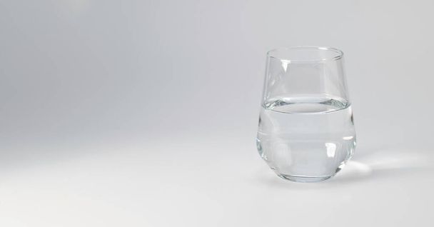 Glass with clean water on white background, copy space, banner - Fotografie, Obrázek