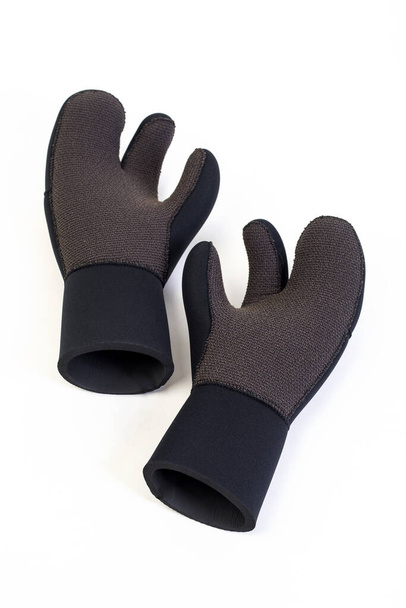 Gloves for spearfishing. Neoprene diving equipment - 写真・画像