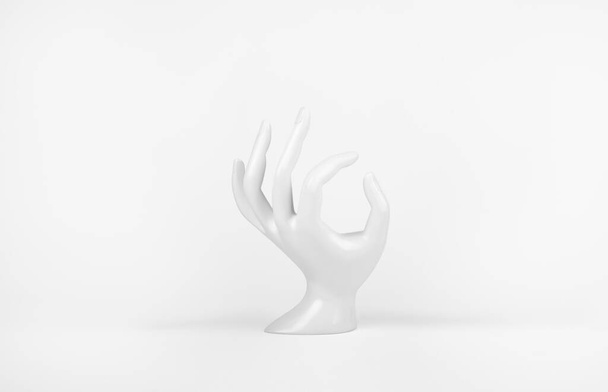 ladies plastic white hand for rings on white background. - Photo, Image