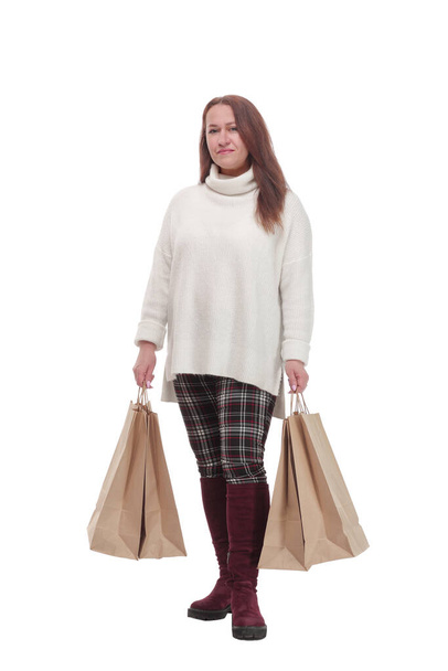 casual woman with shopping bags .isolated on a white background. - Zdjęcie, obraz