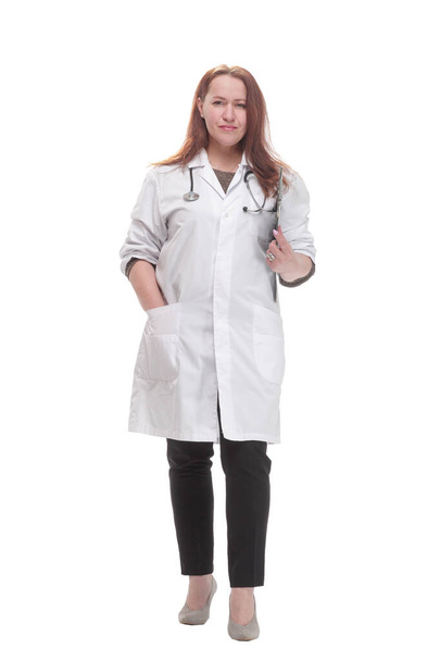 mature female doctor with clipboard. isolated on a white background. - Zdjęcie, obraz