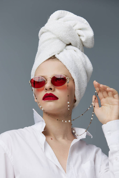 fashionable woman red glasses towel on head makeup studio model unaltered - Photo, Image