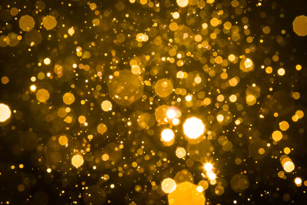 Абстрактное размытие золотого блеска боке фон - Фото, изображение