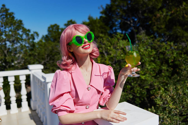 portrait of beautiful woman outdoor landscape leisure restaurant Drinking alcohol - Photo, Image