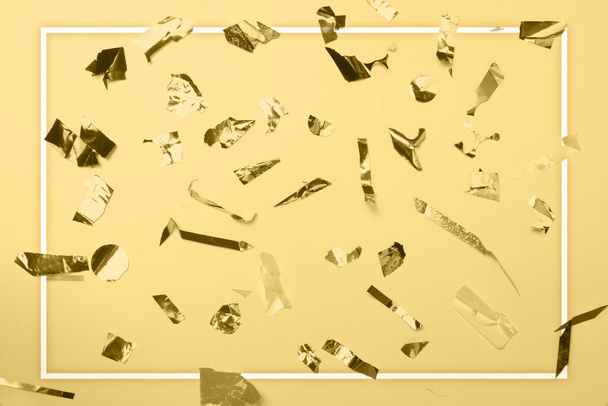 Golden confetti with colored background - Foto, imagen